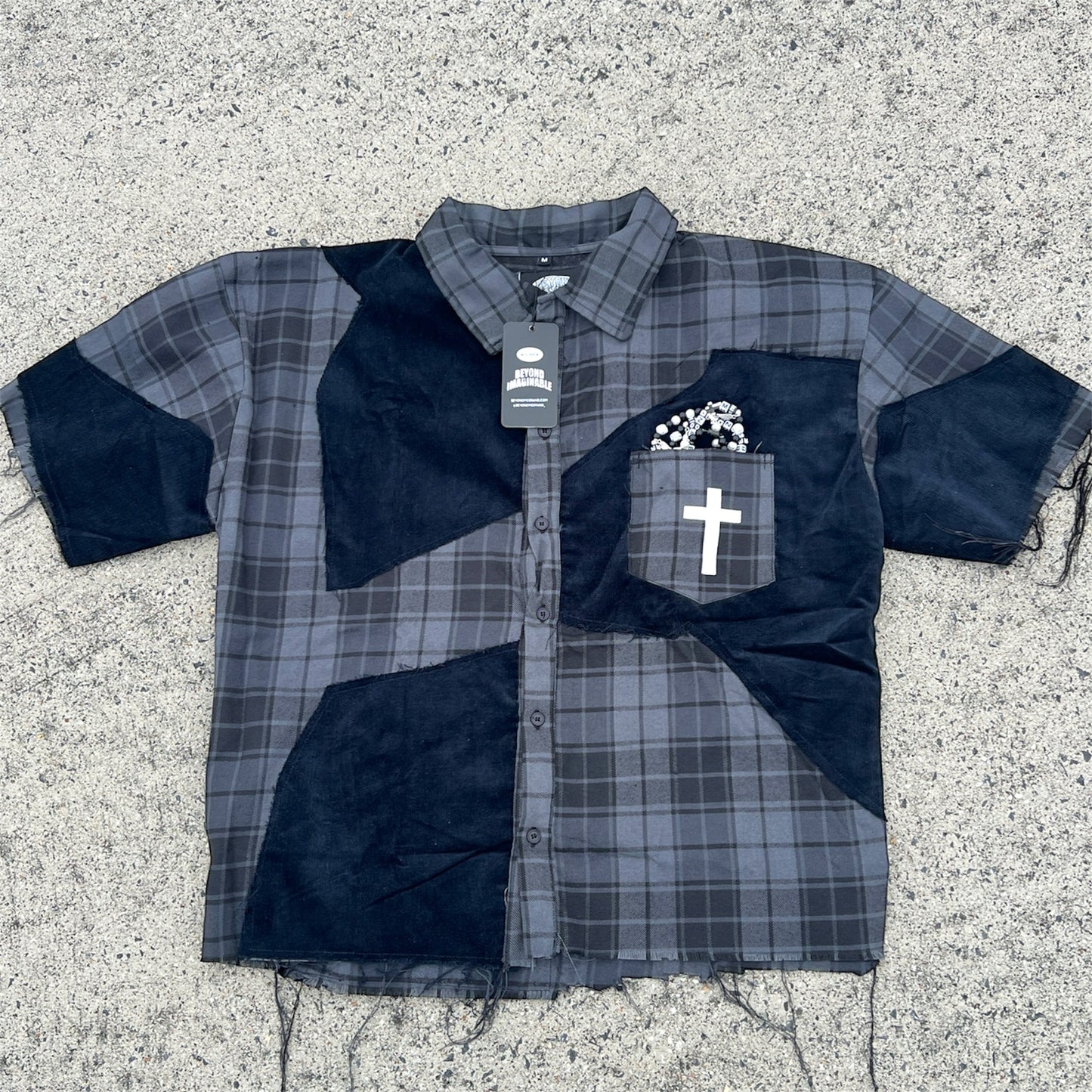 "BEYOND IMAGINABLE" BUTTON UP
