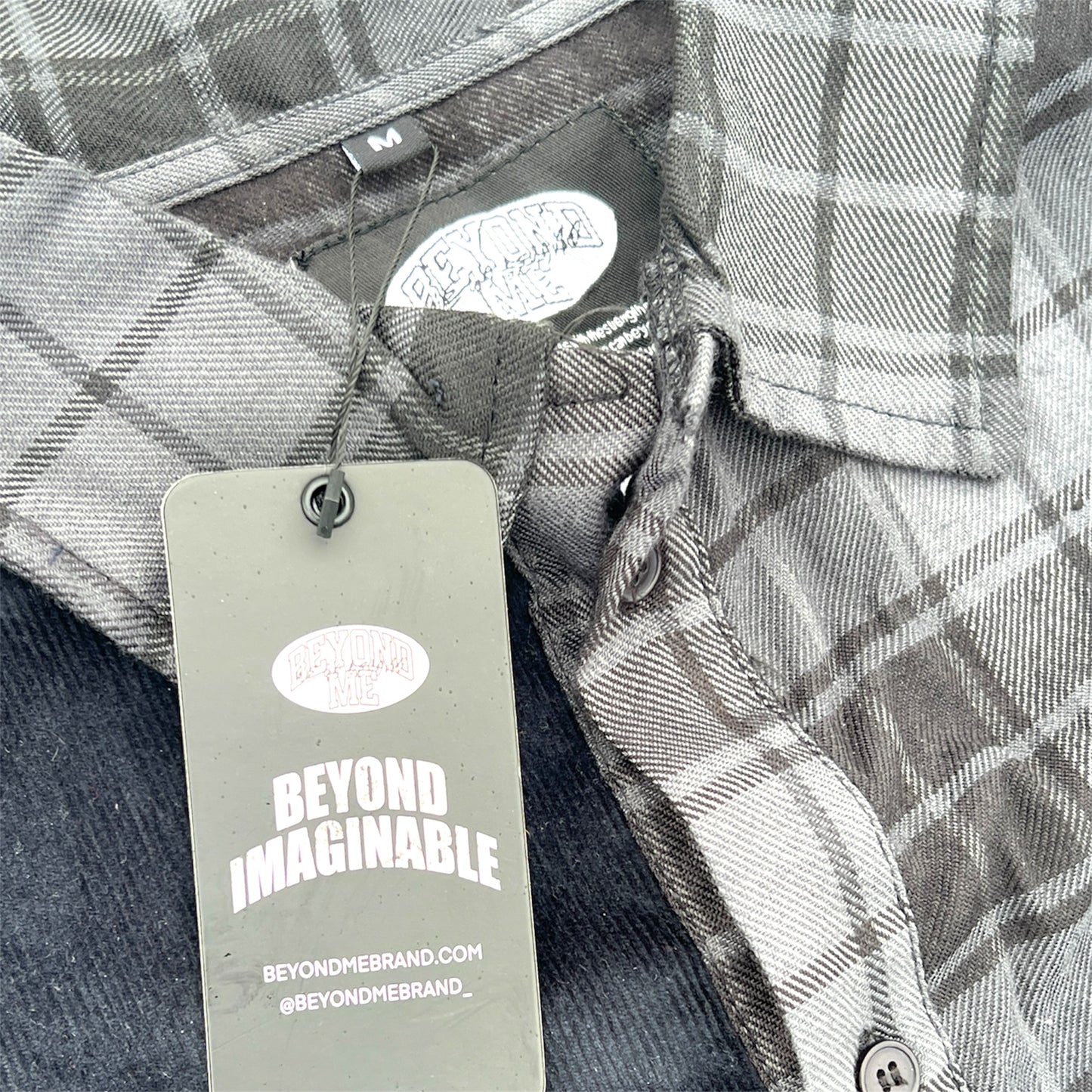 "BEYOND IMAGINABLE" BUTTON UP