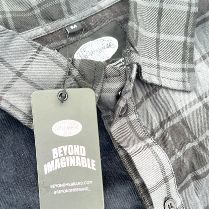 "BEYOND IMAGINABLE"          BUTTON UP
