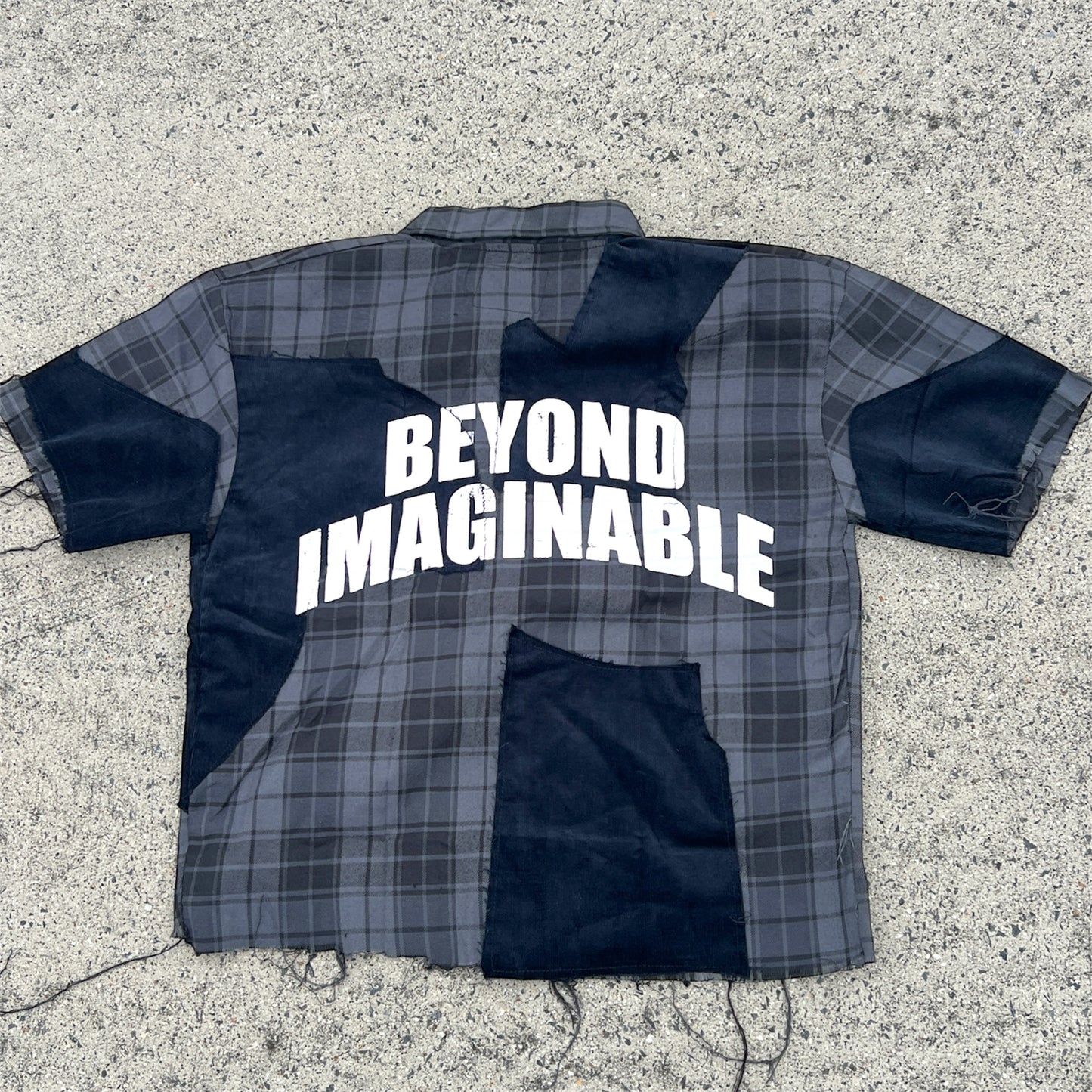 "BEYOND IMAGINABLE"          BUTTON UP